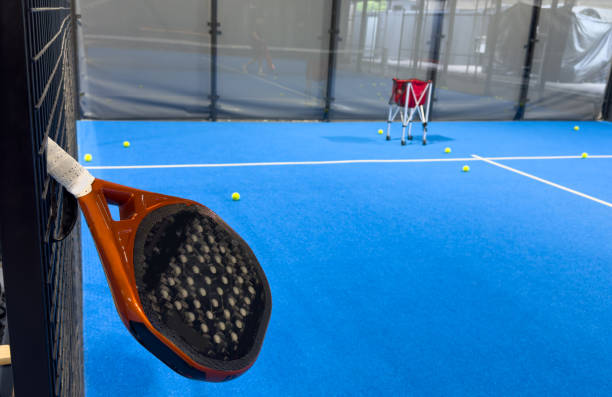 istock paddle rackets on the playing court 2164142794