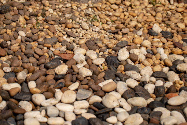 Rocks of various sizes and colors on the ground