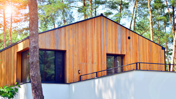 istock Upscale house in wooded area. 2164145227