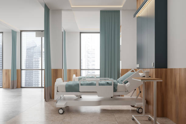 istock Hospital interior room with an empty bed, large windows, and blue curtains, modern design, healthcare concept.  3D Rendering 2164147198