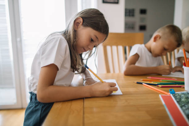 istock Kids Drawing Together 2164147841