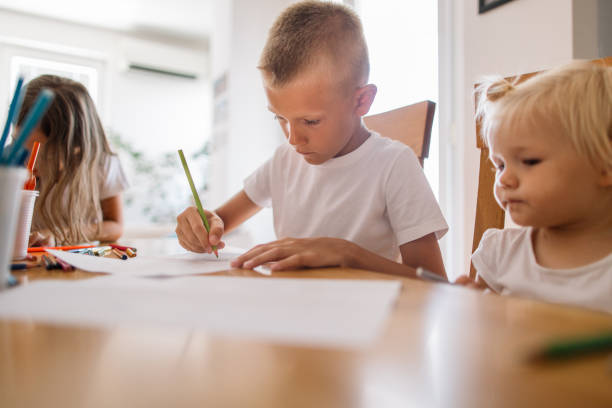 istock Kids Drawing Together 2164147845