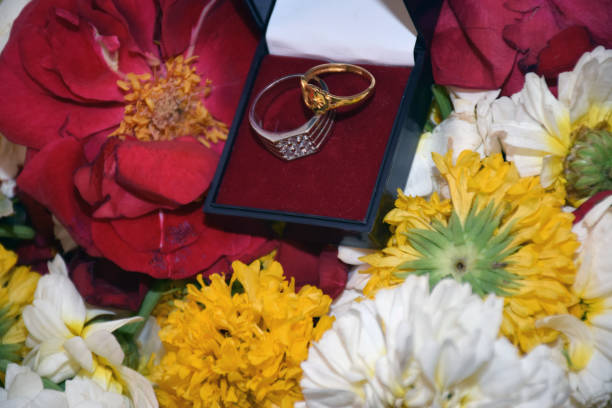 ring ceremony, Beautiful Engagement ring on flower background blur selective focus on subject