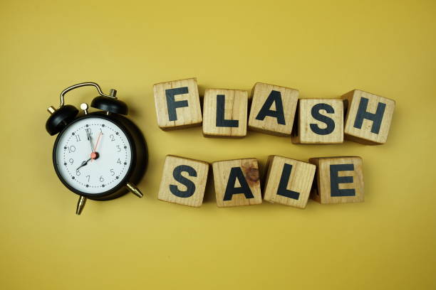 istock Flash Sale alphabet letters top view on yellow background 2164152790