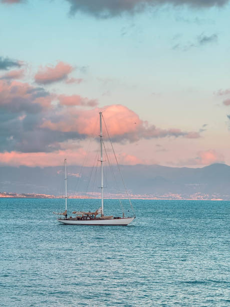 Sunset and boats on water, Monkey Mia Western Australia