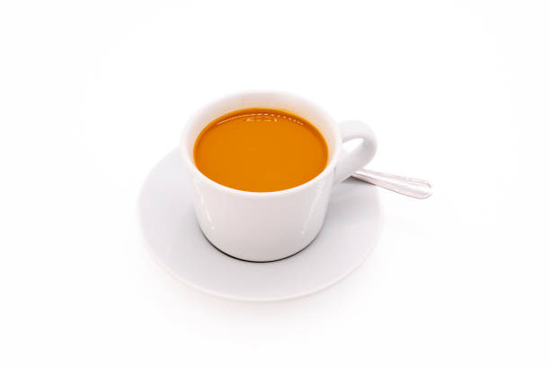 istock Creamy coffee on a white porcelain cup 2164154639