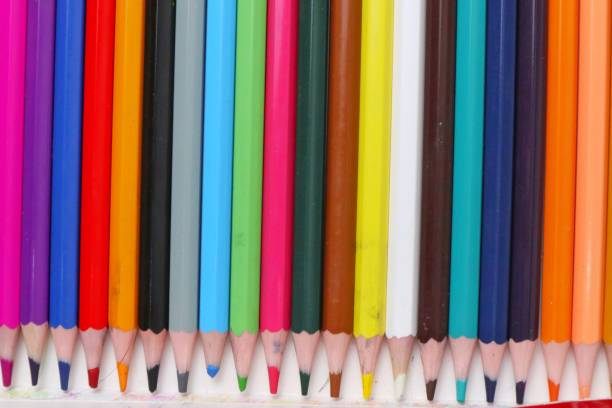 istock row of colored pencils on a white background 2164157710