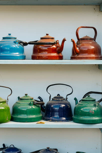 istock Colorful Vintage Teapots on Display Shelf 2164159127
