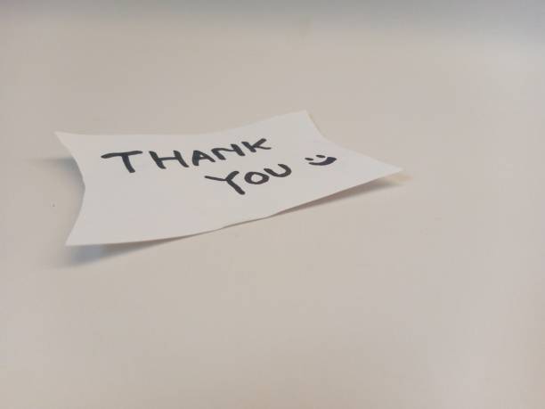 istock Thank you message for card, presentation, business. Expressing gratitude, acknowledgment and appreciation. Minimalist abstract design with white cut out paper on Canary white background. 2164159985