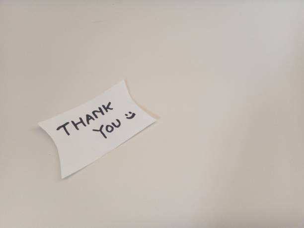 istock Thank you message for card, presentation, business. Expressing gratitude, acknowledgment and appreciation. Minimalist abstract design with white cut out paper on Canary white background. 2164160033