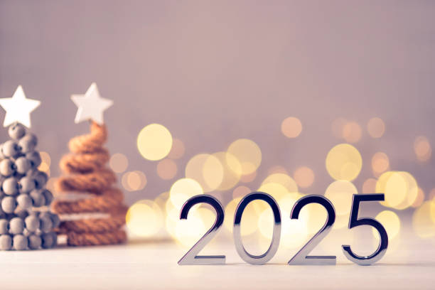 istock Metal numbers 2025 on table with bokeh lights. 2164164670