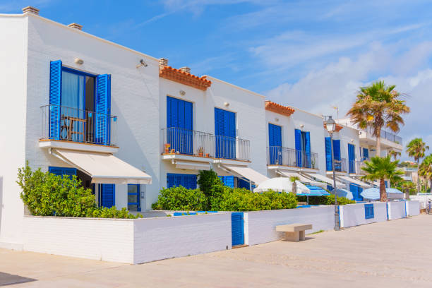 istock Charming Coastal Houses in Tarragona with Blue Shutters 2164166100