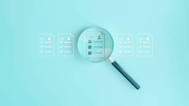 istock Magnifying glass focus to Approve document, HR(human resources) technology.Online and modern technologies for simplifying the human resources system. 2164166320