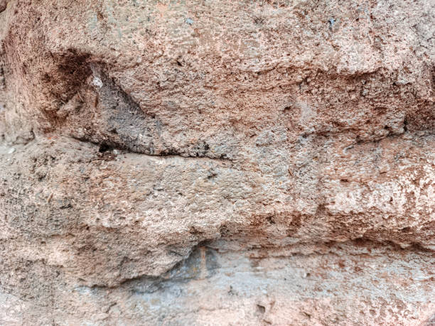 istock naturally sculpted stone walls with brown for the background 2164166487