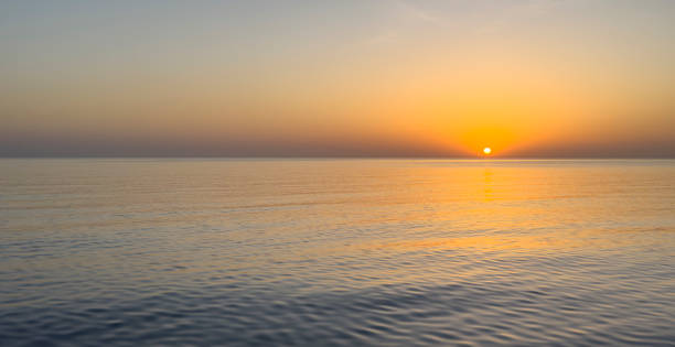 istock sunset over the sea 2164170938