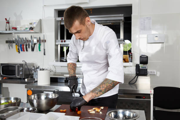 istock Professional chef cooking in the modern kitchen in hotel restaurant, preparing shrimp salad 2164181307