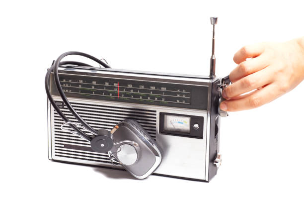 istock Hand tuning radio receiver button. 2164182553