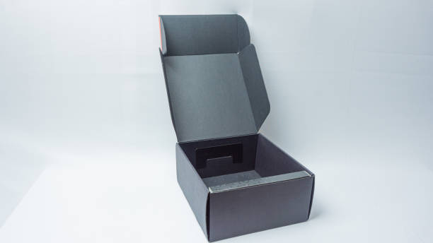 istock Opened black headset packaging box isolated on black background 2164183431