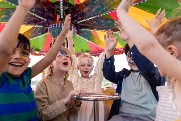 istock Children Riding the Teacups 2164186028
