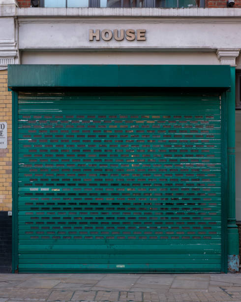 istock Shuttered Business with House Sign 2164186080