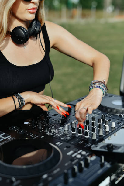 istock Female DJ And Her New Turntable On Mountain 2164188281
