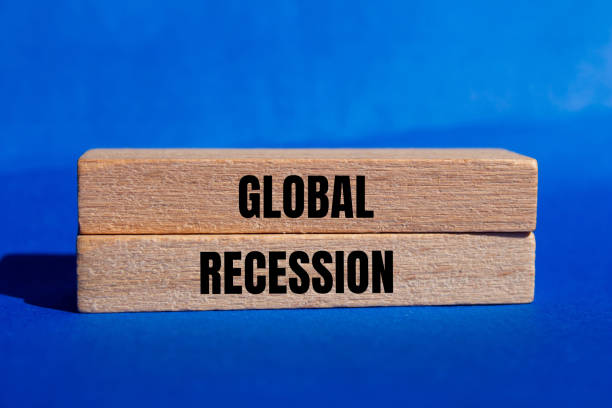 istock Global recession message written on wooden blocks with blue background 2164189334