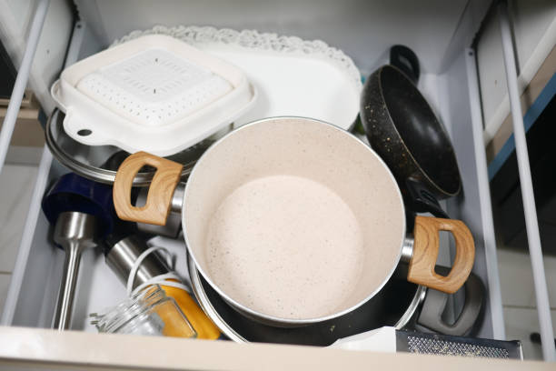 Dirty dishes in old sink.