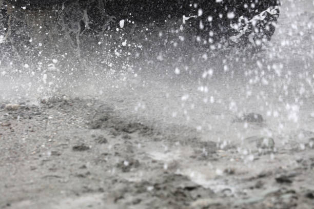 istock Off road vehicles driving in water 2164195682