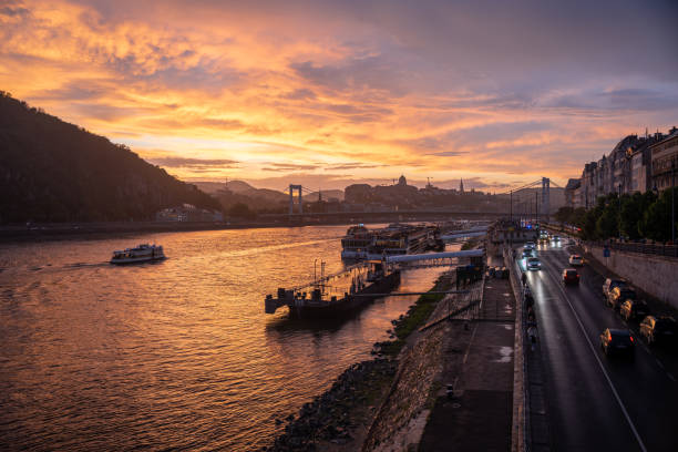 Budapest, Hungary - May 02, 2024: Beautiful sunset, landscape view from liberty bridge.