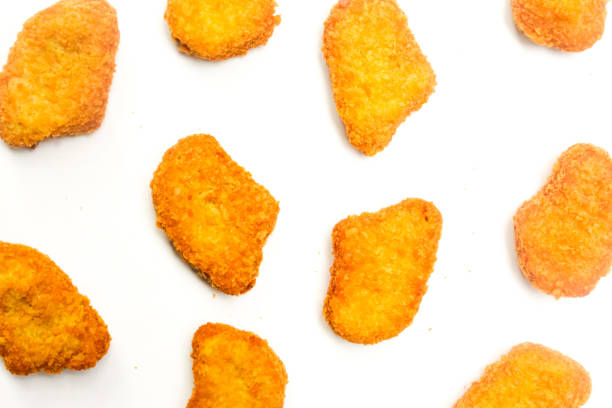 istock chicken nuggets isolated on white background 2164202067