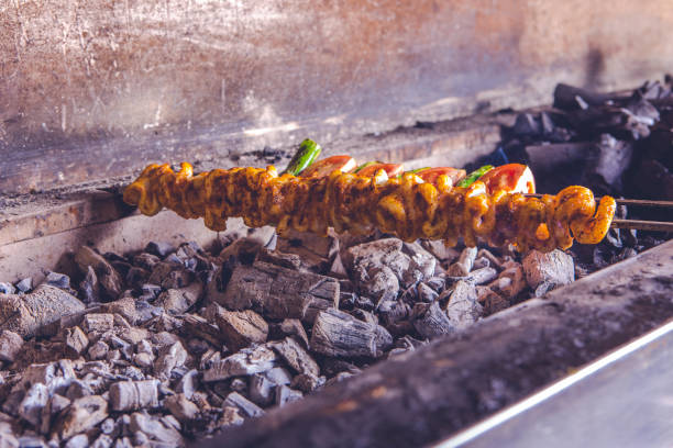 istock Delicious Shish Kebabs Cooking on the Grill 2164207014