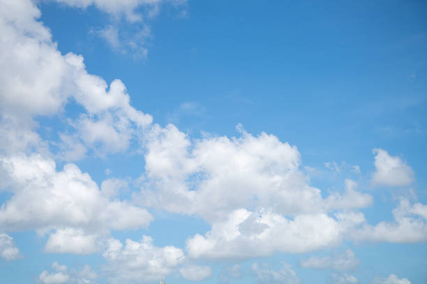 Beautiful blue sky and white cumulus clouds abstract background. Cloudscape background. Blue sky and fluffy white clouds on sunny days. Blue sky and daylight. World Ozone Day. Ozone layer. Summer sky.