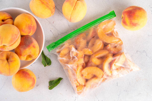 istock Frozen peaches in freezing bags 2164212966
