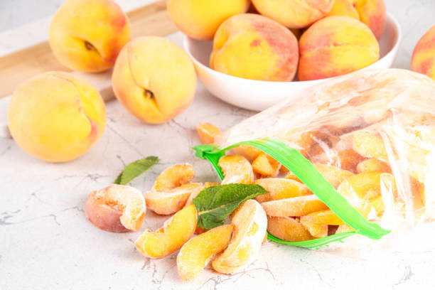 istock Frozen peaches in freezing bags 2164212969