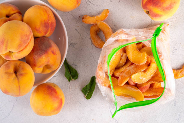 istock Frozen peaches in freezing bags 2164212975