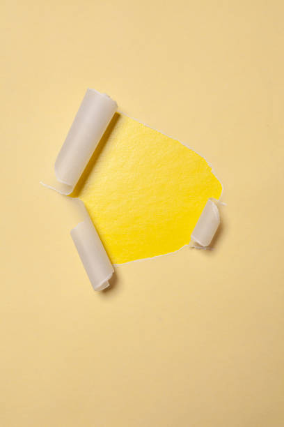 istock Paper hole with torn sides in paper texture with copy space 2164216571