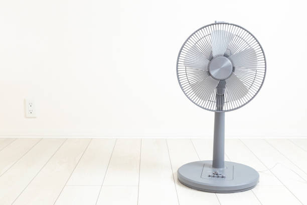 istock Electric fan in a white room 2164222261