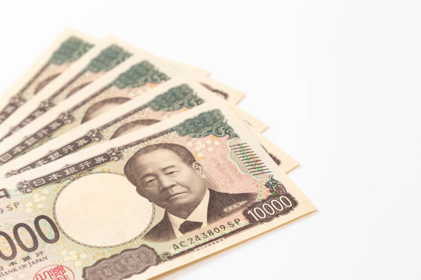istock 10,000 yen bill on white background 2164222321