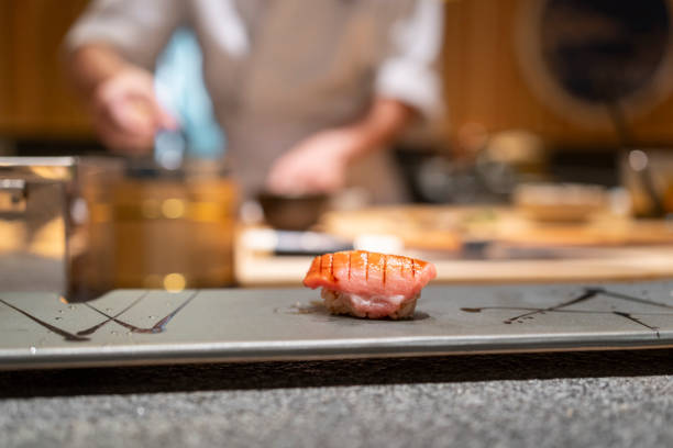 istock Chef is making Japanese Omakase in the restaurant 2164228308