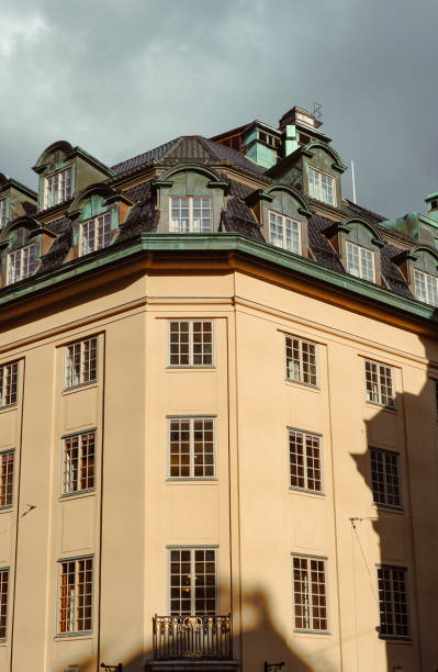 Low angle view of a building against cloudy sky