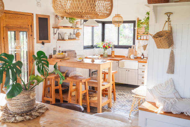 istock Country kitchen, rustic style. Breakfast area and wooden benches. Wicker lamp. Kitchen accessories 2164237206