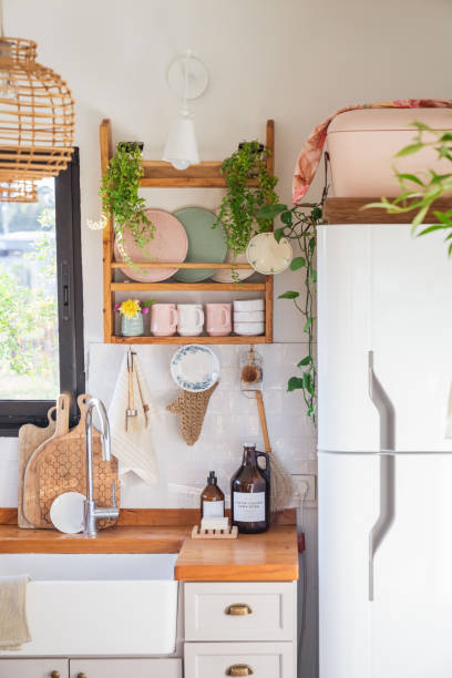 istock Rustic style country house kitchen. Sink and refrigerator. 2164237223
