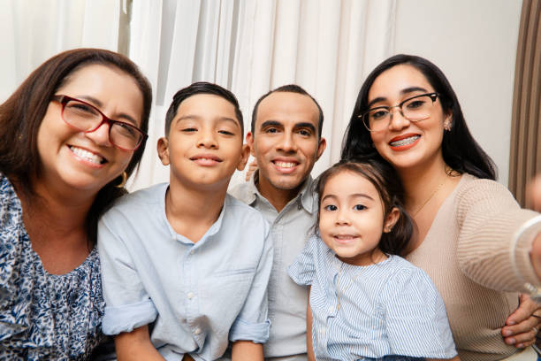 istock Hispanic Family together taking a selfie. Perspective personal 2164237731