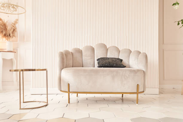 istock Creative composition of the living room interior with an uneven sofa in a modern style, a pot with a plant. Home decor. Pattern 2164246113