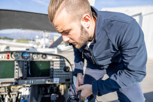 istock Pilot Preparing Cables in Small Aircraft Cockpit 2164251606