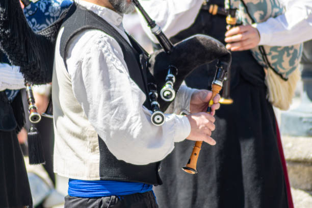 istock an unrecognizable man dressed in the typical costume playing the bagpipe in Galicia 2164252854