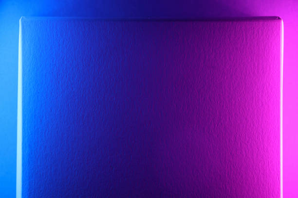 Geometrical shaped papers under neon lights