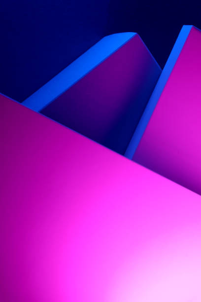 istock Geometrical shaped papers under neon lights 2164255771