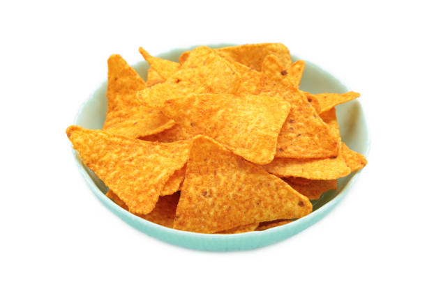 istock Crispy corn tortilla nachos chips in bowl isolated on white background 2164256882