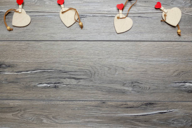 Hearts on wooden background